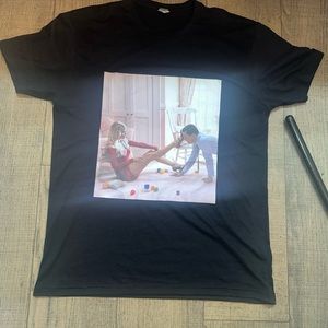 T- shirt. Graphic tee. Size large. Color black